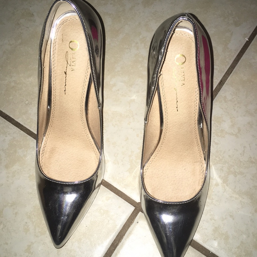Olivia heels . It’s all man made material